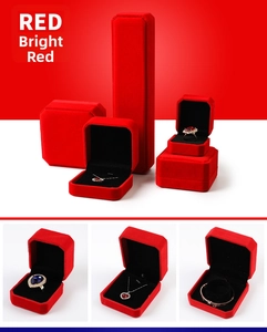 Red velvet jewelry boxes with black lining for rings, necklaces, and bracelets