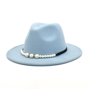 Detail view of light blue wool fedora hat featuring black grosgrain ribbon with white pearls