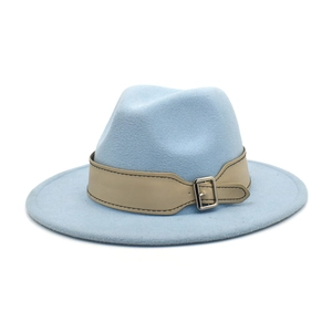 Detail of light blue wide brim fedora hat with beige leather strap and silver metal buckle