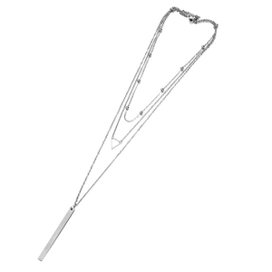Detailed view of triple-layered silver necklace with bead, triangle and bar pendants