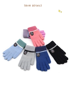 Detailed view of warm knit gloves for kids with classic shield patch in multiple colors
