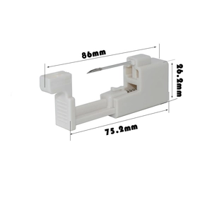 White disposable body piercing tool with detailed length measurements and steel needle