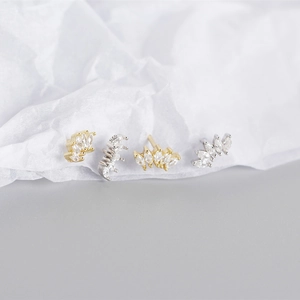 Detailed view of marquise-cut zircon earrings with 925 sterling silver hallmark