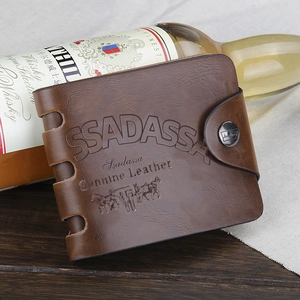 Close-up of brown genuine leather tri-fold wallet with embossed logo and snap closure