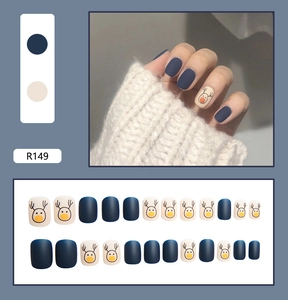 Short square matte blue and beige press-on nails with cute reindeer patterns, model R149