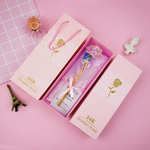 Detail view of 24K gold foil rose set with pink gift box, sleeve and certificate card