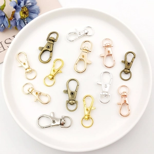 Assorted alloy lobster clasps in gold silver and bronze for bag hardware DIY projects
