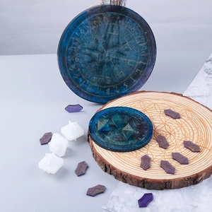 Macro view of Nordic rune silicone resin molds with celestial blue compass finished pieces