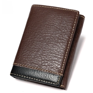 Detail view of genuine leather tri-fold wallet with RFID blocking and contrast stitching