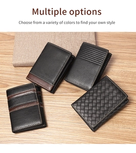 Flat lay of genuine leather men's RFID wallets in various textures on a wood desk