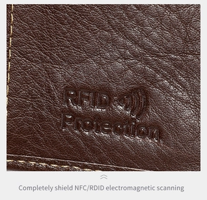 Close-up of brown leather wallet with RFID Protection embossed logo and fine stitching