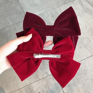 Elegant red velvet bow hair clip set with metal duckbill clips for women's hairstyle