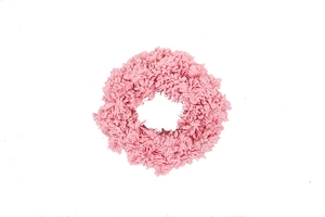 Close-up of a soft pink plush scrunchie made of premium velvet for hair styling