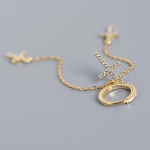 Elegant gold S925 sterling silver cross earrings with tassels and sparkling crystals