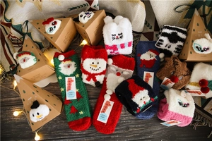 Cozy coral fleece Christmas socks in gift boxes with reindeer and snowman patterns
