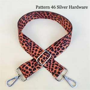 Detail of leopard print wide strap with silver metal buckles for crossbody bags