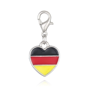 Detail of heart-shaped charm with German flag colors and lobster clasp attachment