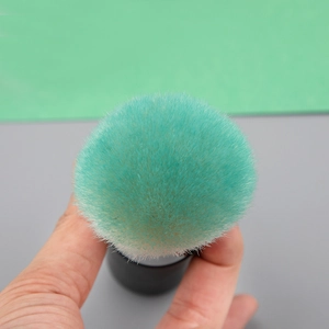 Pinceau poudre large vert menthe avec poils en fibres douces et manche noir