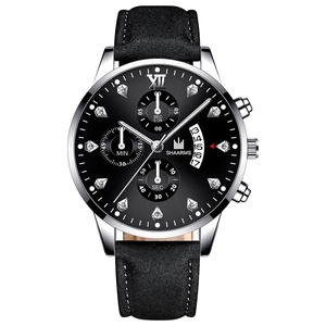 Detailed view of SHAARMS business watch featuring a calendar window and diamond markers
