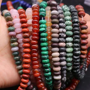 Macro view of natural stone abacus beads in various colors for DIY jewelry making