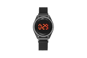 Macro shot of stylish LED watch with rhinestone bezel and faceted black glass face