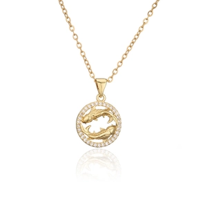 Close-up of golden Pisces pendant with micro-inlaid zircons and fine O-chain necklace