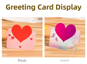 Detailed comparison of pink heart and purple butterfly themed creative greeting cards