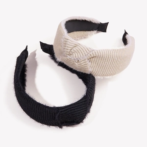 Knitted mohair headband set featuring black and beige ribbed fabric with plush lining