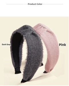 Detail of wide knitted mohair headbands in dark grey and pink with plush texture