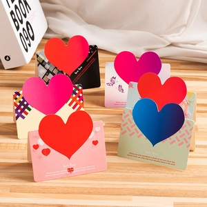 Set of 6 creative 3D heart greeting cards with romantic text on wood surface