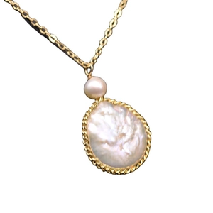 Golden necklace with natural freshwater round pearl and baroque pearl pendant on white background