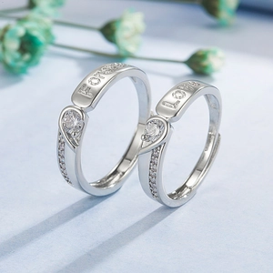 Silver-colored heart couple rings set with zircon and Forever Love engraving