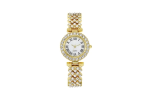 Detail view of gold women's watch with crystal rhinestones and Roman numeral dial