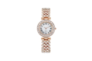 Detailed close-up of rose gold quartz watch with rhinestones and Roman numerals