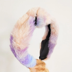 Detail of soft faux rabbit fur headband featuring pink, purple and blue gradient texture