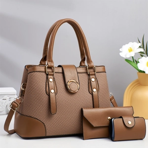 Three-piece brown leather tote bag set including handbag, long wallet and card holder