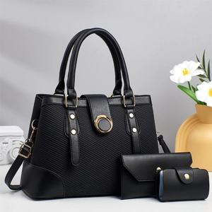 Three-piece black tote bag set including handbag, wallet and card holder with gold hardware