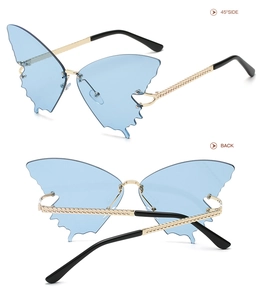 Detail of blue butterfly sunglasses with gold braided metal temples and 45-degree view