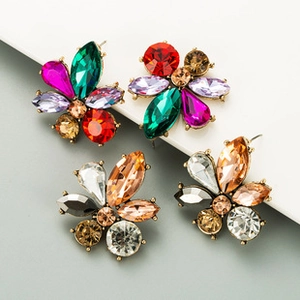 Detailed view of floral crystal stud earrings with vibrant multi-colored gemstone petals