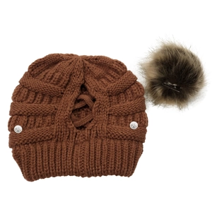 Brown knit beanie with faux fur pom-pom and rose-embossed silver buttons for winter