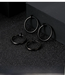 Detail showing two pairs of black stainless steel spring clip-on rings in two sizes