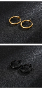 Detail of spring-loaded steel rings in gold and black finishes for non-pierced ears