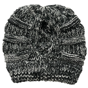 Detail of cross elastic ponytail hole and black-white knitted texture on beanie