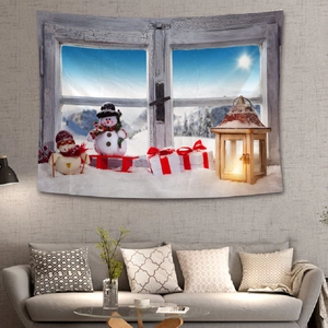 Detail of Christmas wall tapestry showing a snowy winter window view on a textured wall