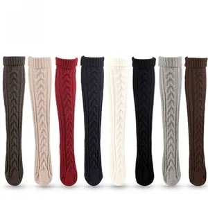 Detail of cable knit leg warmers in eight colors with classic patterns for winter