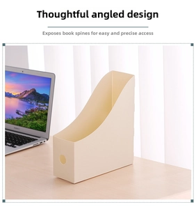 Detail of a beige slanted file organizer on a wooden desk with a convenient round pull hole