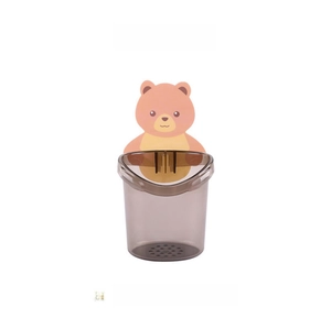 Macro detail of bear bathroom shelf with drainage holes for toothbrushes and combs