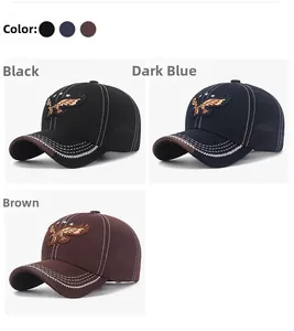 Detailed view of eagle embroidery and contrast stitching on cotton baseball caps