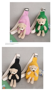 Detailed view of four colorful canvas chest bags for kids featuring 3D plush bear charms