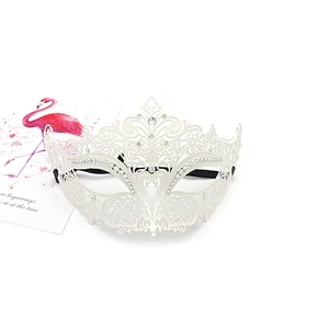 Intricate white laser-cut metal masquerade mask with sparkling rhinestone details